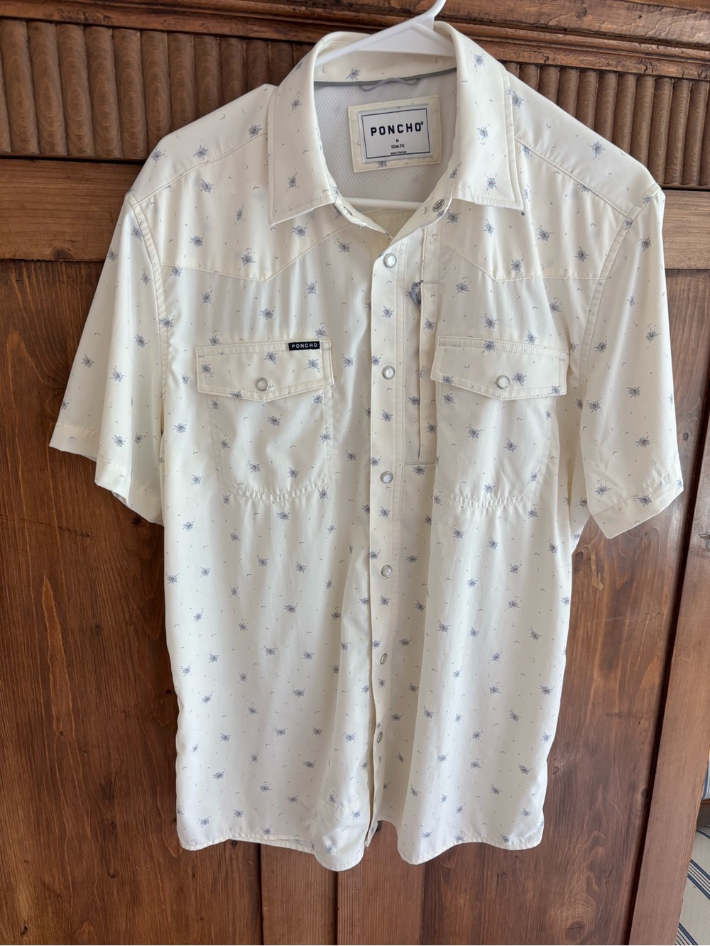 Poncho White Short-Sleeve Casual Button-Down Shirt with Subtle Blue Print